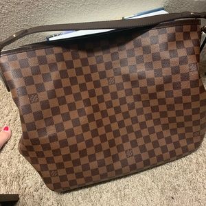 Louis Vuitton Delightful MM handbag.